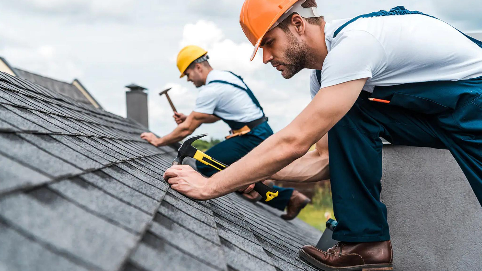 handymen repairing roof with coworker after receiving job from roofing SEO services